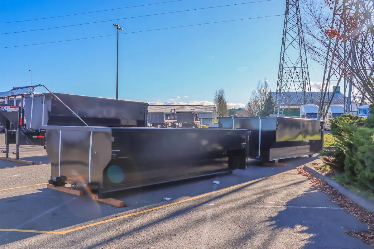 Roll-off dumpster ready for waste disposal at job site for Roofing Dumpster Rental in Weare